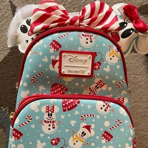 Loungefly Disney snowman Mickey and Minnie AOP mini backpack and headband set.
